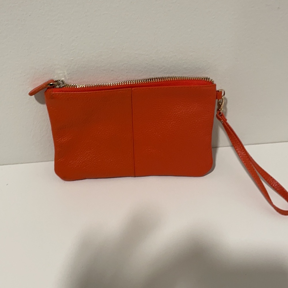 Orange pebbled leather clutch